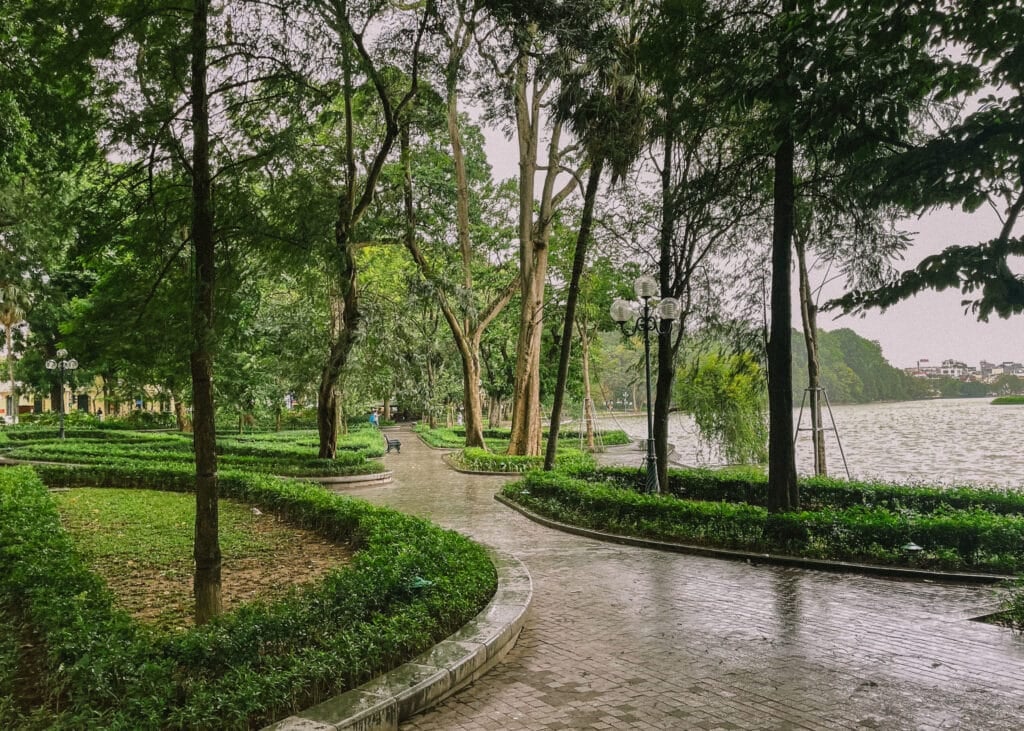 Hanoi park path along Hoan Kiem Lake, a peaceful spot for things to do in Hanoi.