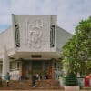 Ho Chi Minh Museum facade with socialist art. Things to do in Hanoi, Vietnam.