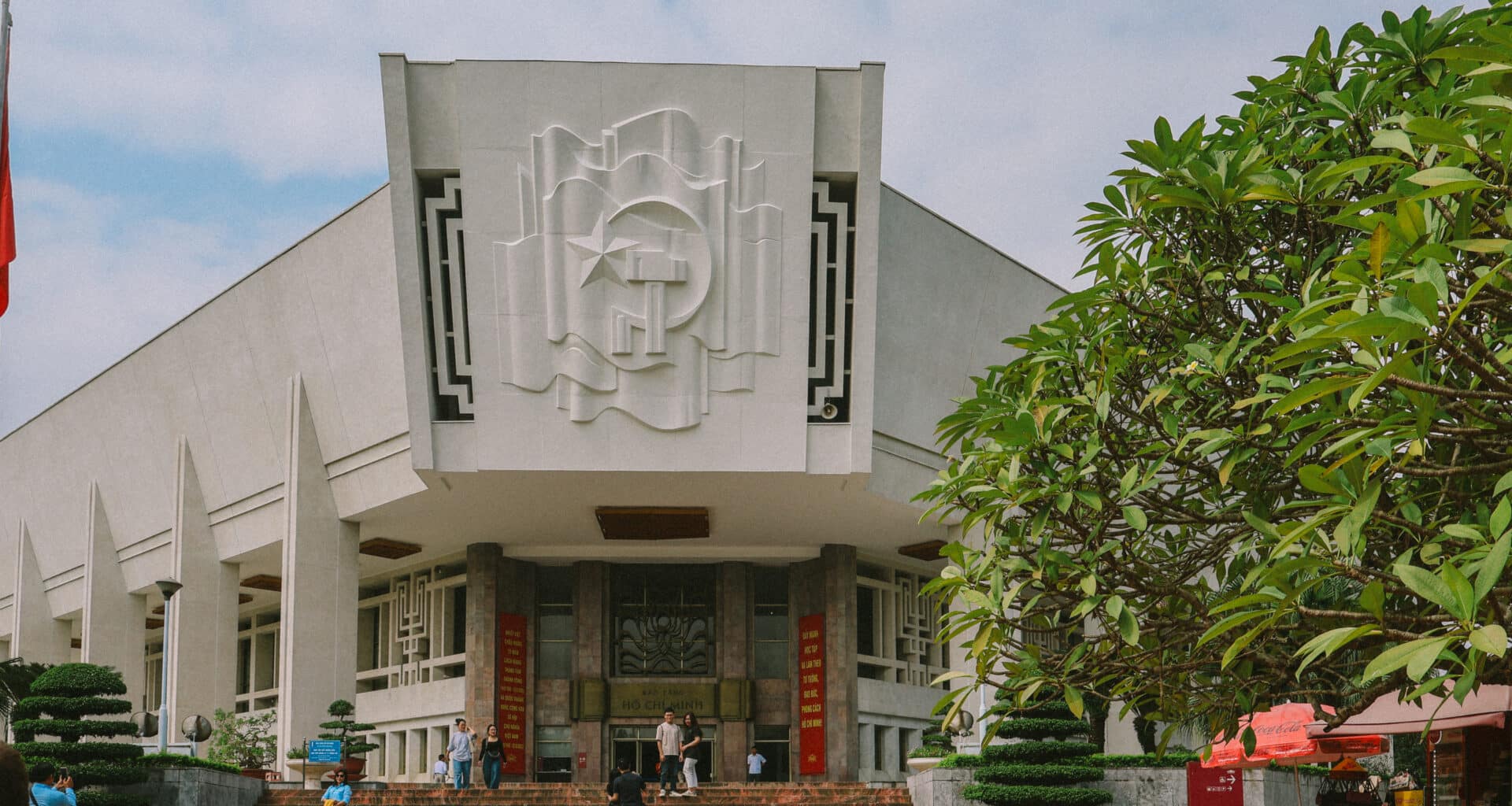 Ho Chi Minh Museum facade with socialist art. Things to do in Hanoi, Vietnam.