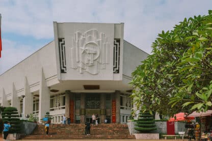 Ho Chi Minh Museum facade with socialist art. Things to do in Hanoi, Vietnam.
