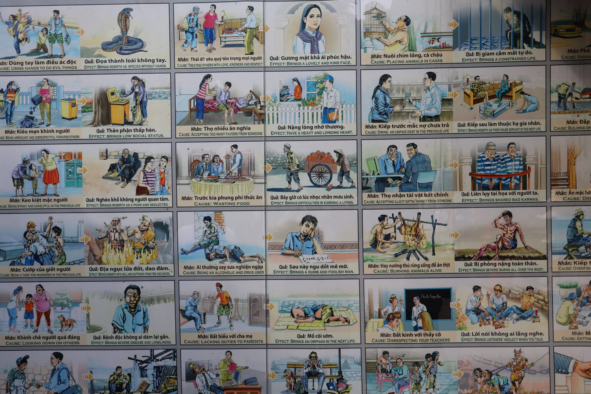 Karma illustrations in Hanoi, representing causes & effects. "Things to do in Hanoi" for cultural insight.