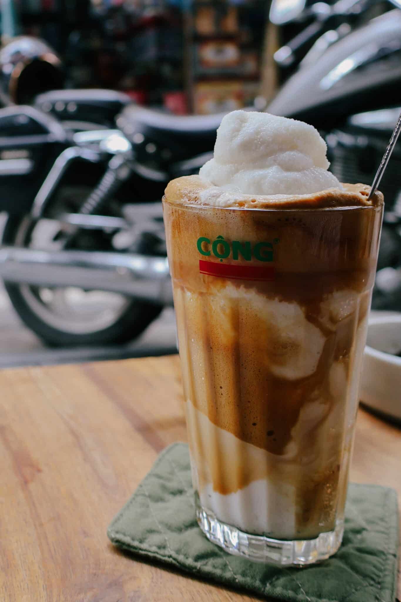 Vietnamese coffee with coconut milk and foam at Cong Caphe. Hanoi hidden gem.