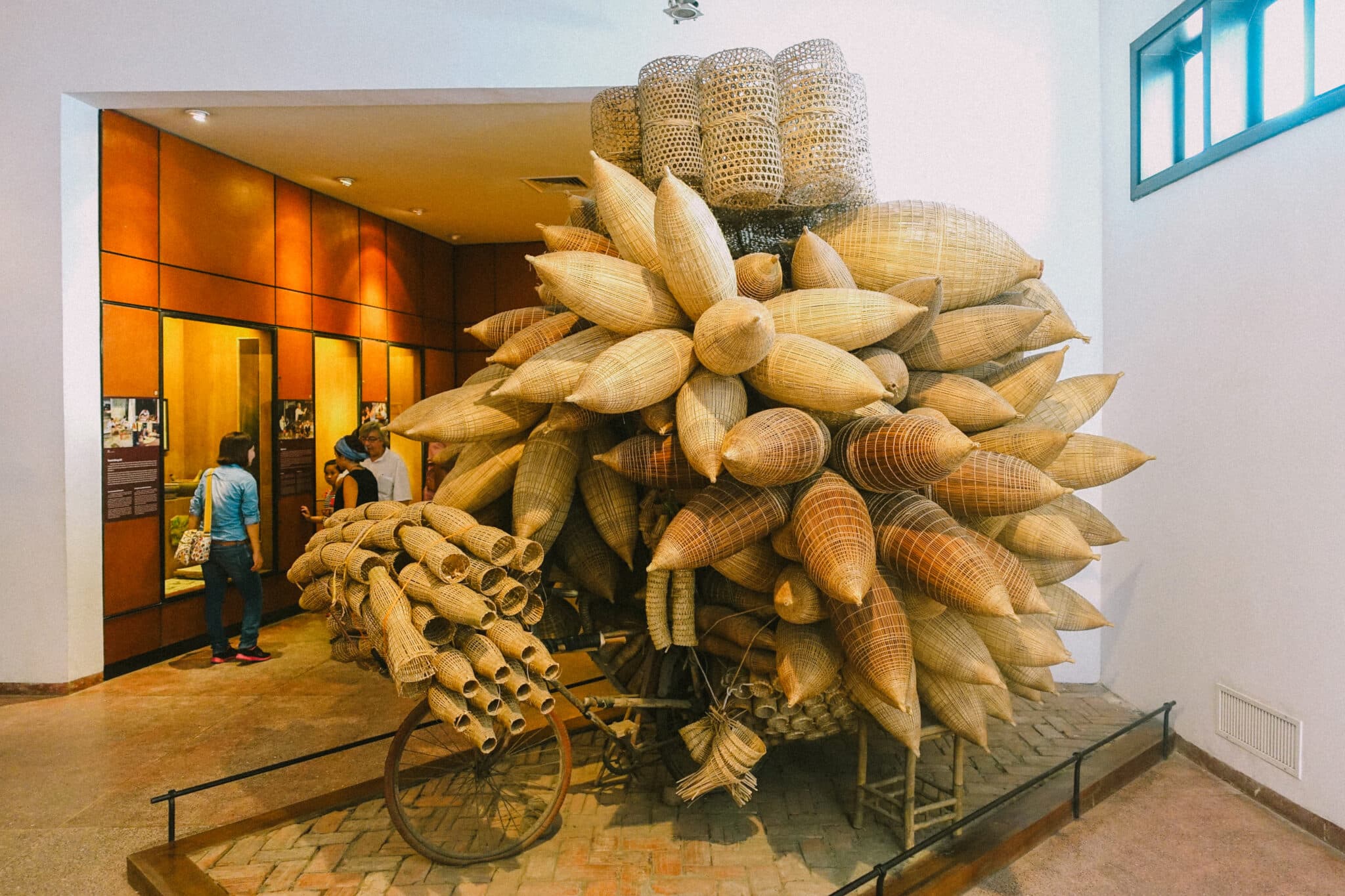 Woven bamboo art installation on a bicycle cart at one of the Hanoi museums.
