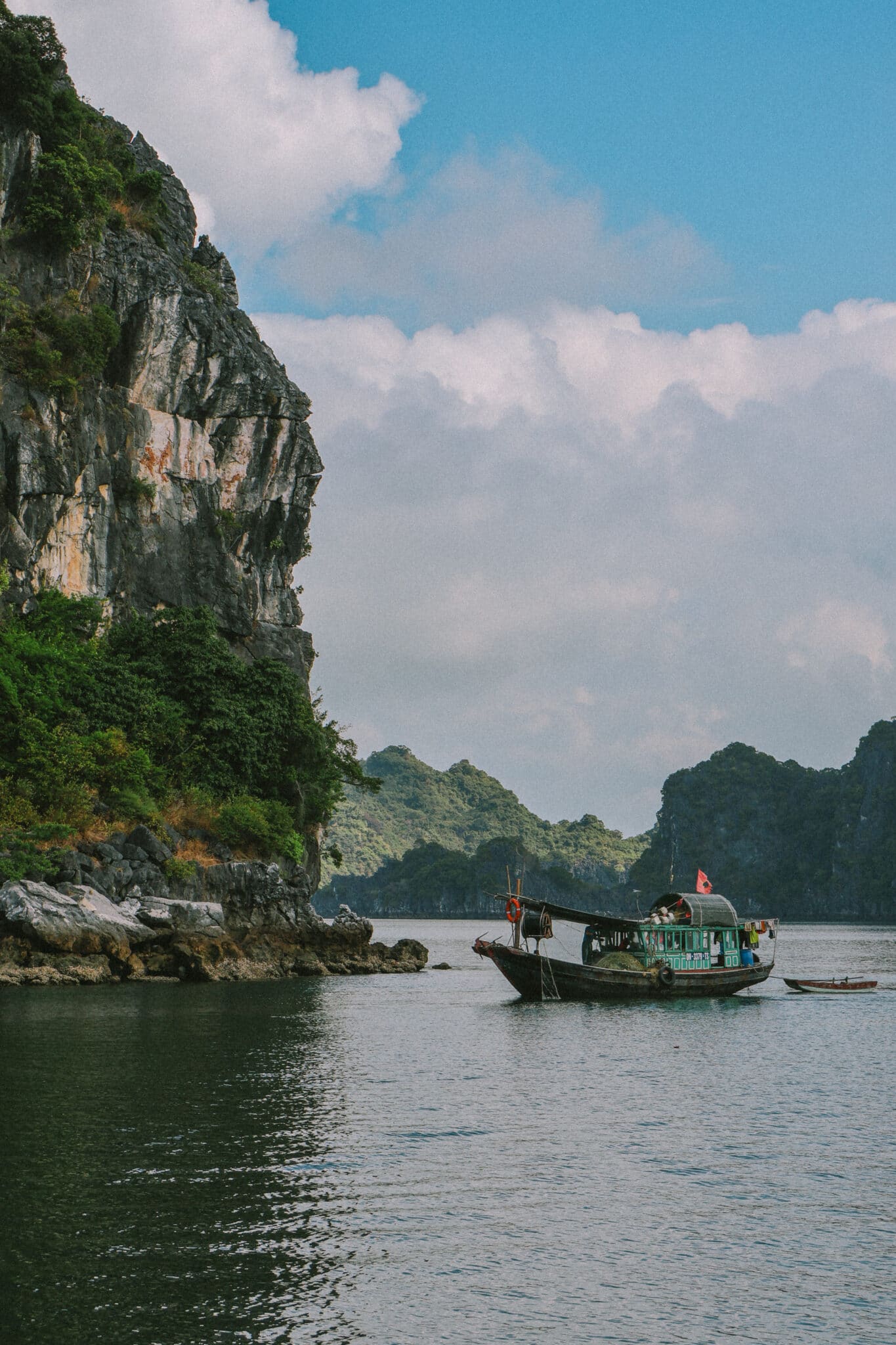 L'Amour Junk on a private Ha Long Bay cruise past limestone karsts