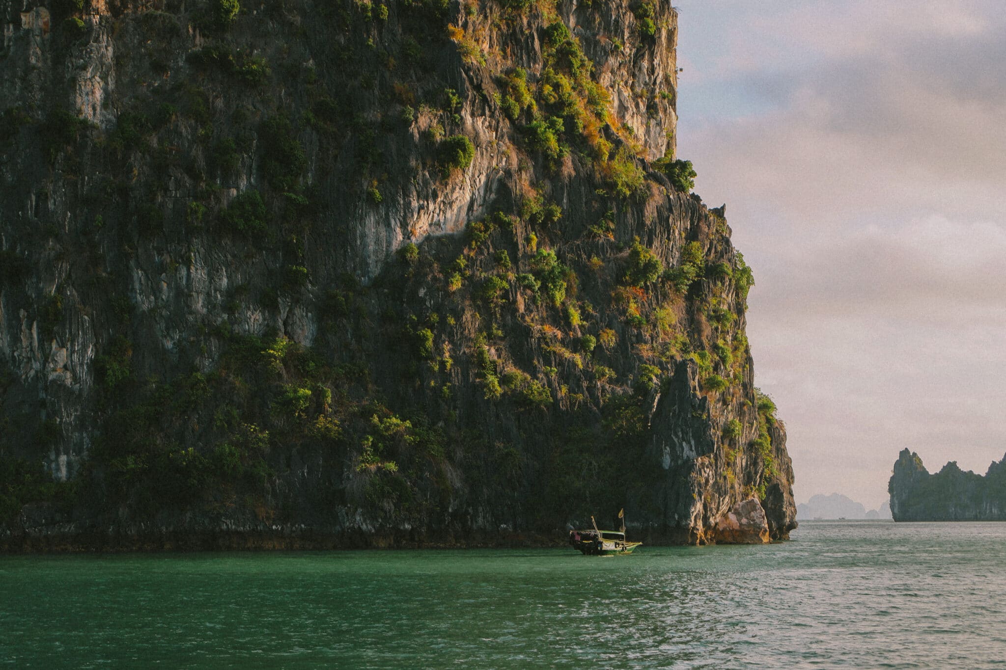 L'Amour Junk on a private Ha Long Bay cruise near towering limestone karsts
