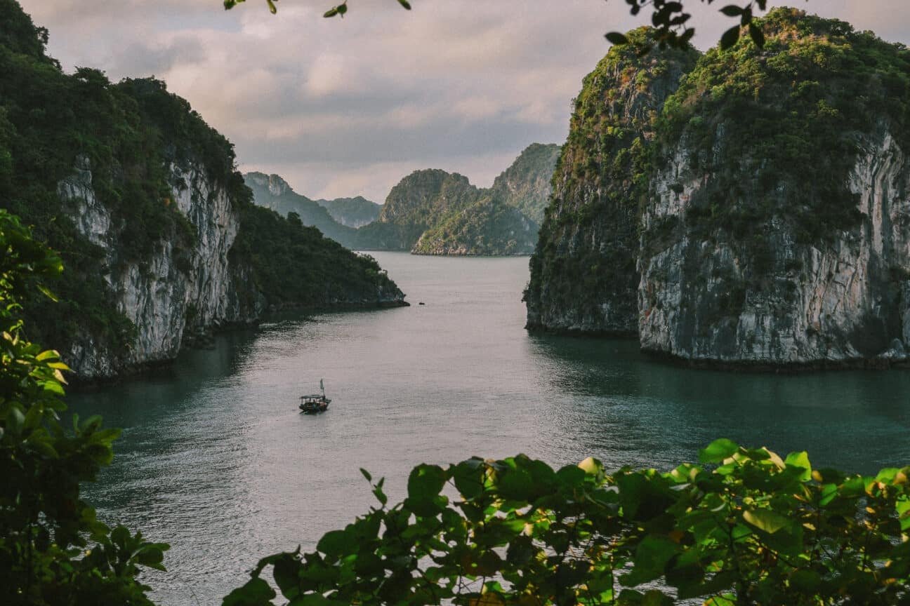 L'Amour Junk on a private Ha Long Bay cruise amidst limestone karsts.