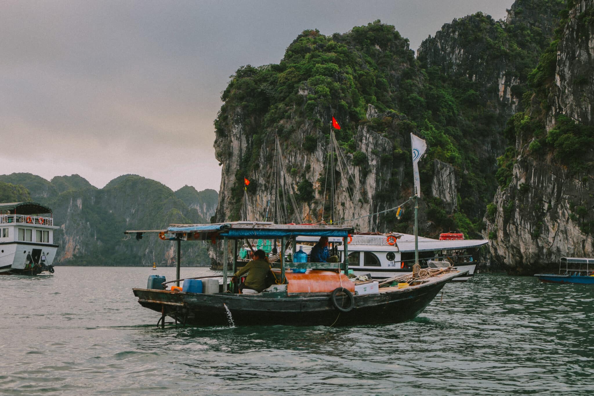 L'Amour Junk on a private Ha Long Bay cruise past limestone karsts