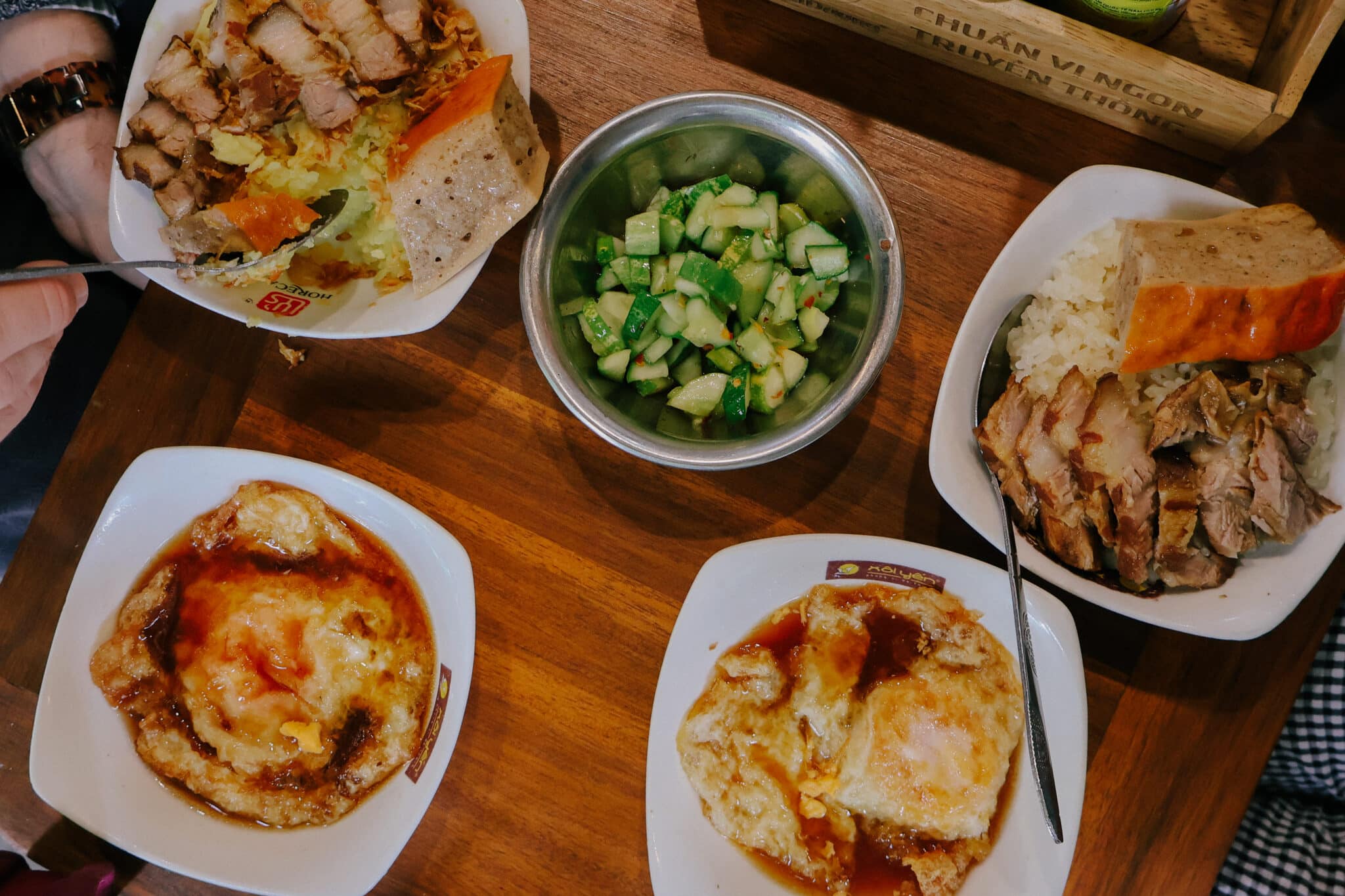 Hanoi Old Quarter street food: com tam, fried eggs, and pickles