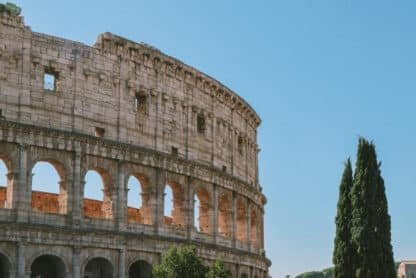 Rome Colosseum view with trees, perfect for a Jet2CityBreak to Rome.