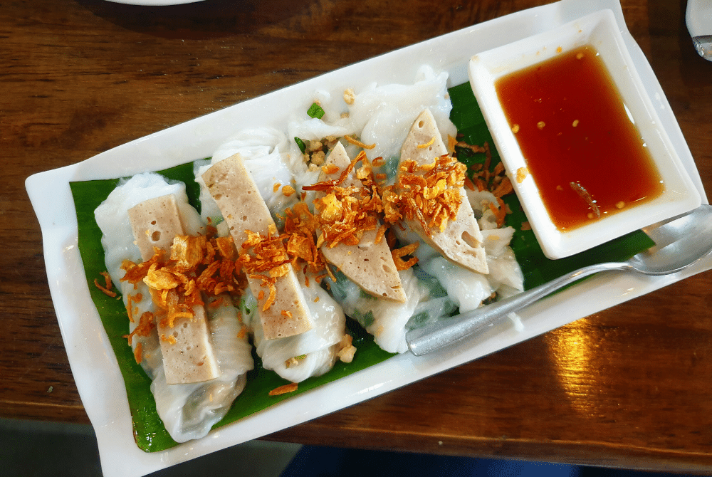 Banh cuon with Vietnamese sausage and fried shallots, a popular Hanoi street food at Banh Cuon Ba Xuan
